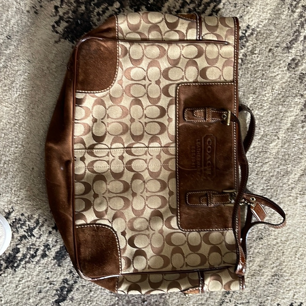 Coach tote. Used and has marks inside.